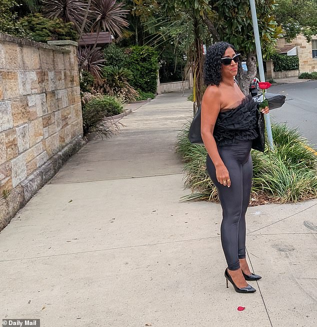 One Golden Bachelor contestant at the mansion where filming is taking place carrying a fresh red rose which indicates she has just been selected by one of the bachelors to remain in the race as the romantic culling process heads towards its March 1 finale