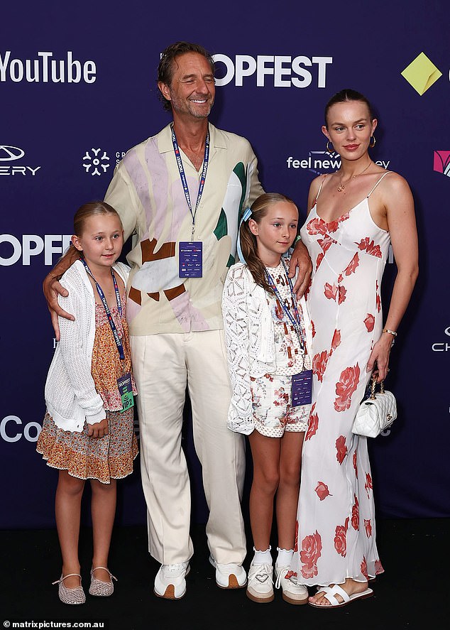 Justin Hemmes and his partner Madeline Holtznagel are settling into life as a blended family. Both pictured