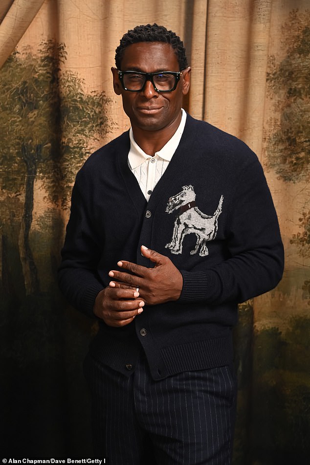 David Harewood opted for a quirky cardigan with an embroidered West Highland terrier dog