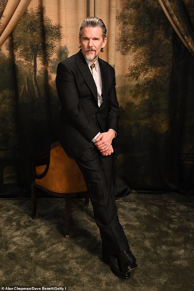 Ethan Hawke dressed up in a shimmering black suit
