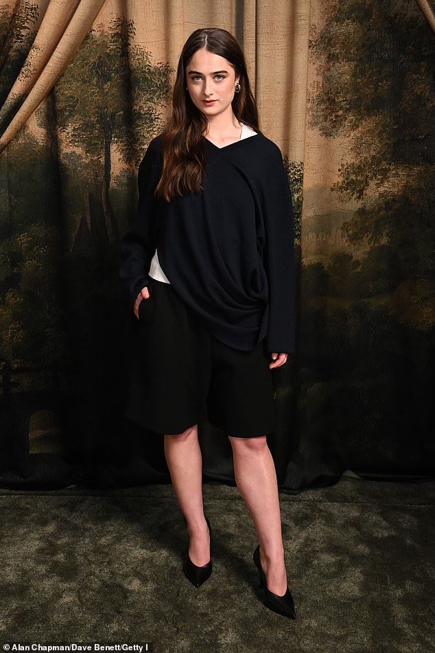 Raffey Cassidy opted for shorts, despite the time of year, and a floaty black top
