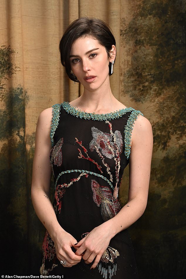 The singer-songwriter wowed in a Chanel backless number which was embellished with a goldfish print