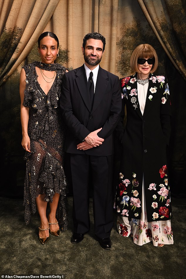 Head of Editorial Content for British Vogue Chioma Nnadi and Adam Baidawi posed with Anna Wintour