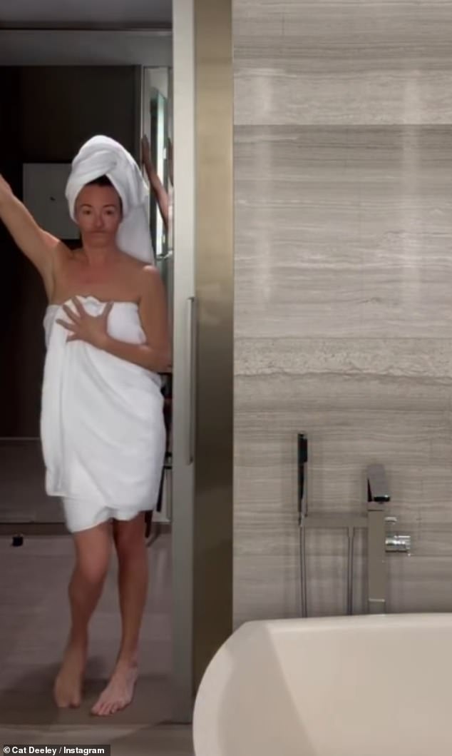 Cat Deeley cheekily danced in a towel as she shared a hotel 'get ready with me' video clip on Instagram on Thursday