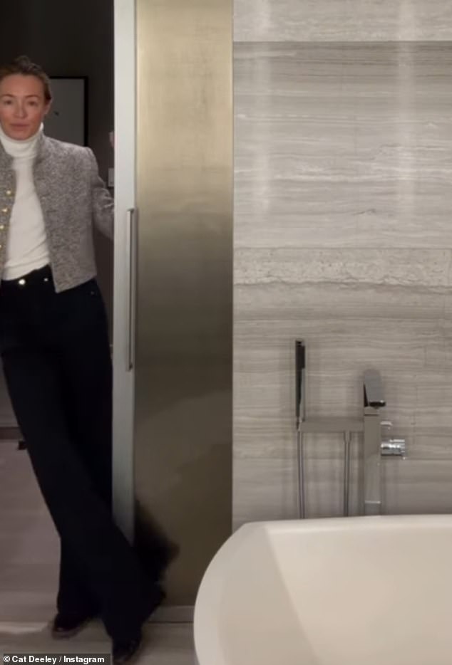 The TV presenter looked stunning in a cropped tweed blazer, a white turtleneck top, and black jeans