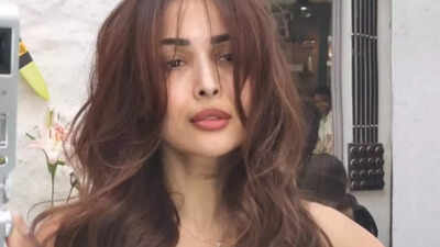 Malaika Arora reveals the secret to her flat belly with 'Malla morning routine' in new workout video - Watch