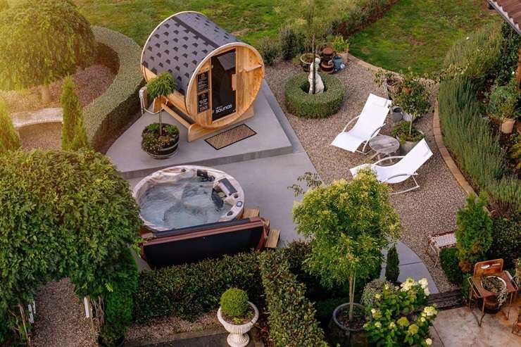 Corina Montgomery and David Lawrence are selling their French chateau, which looks centuries old but was completed in 2018. Photo / Supplied