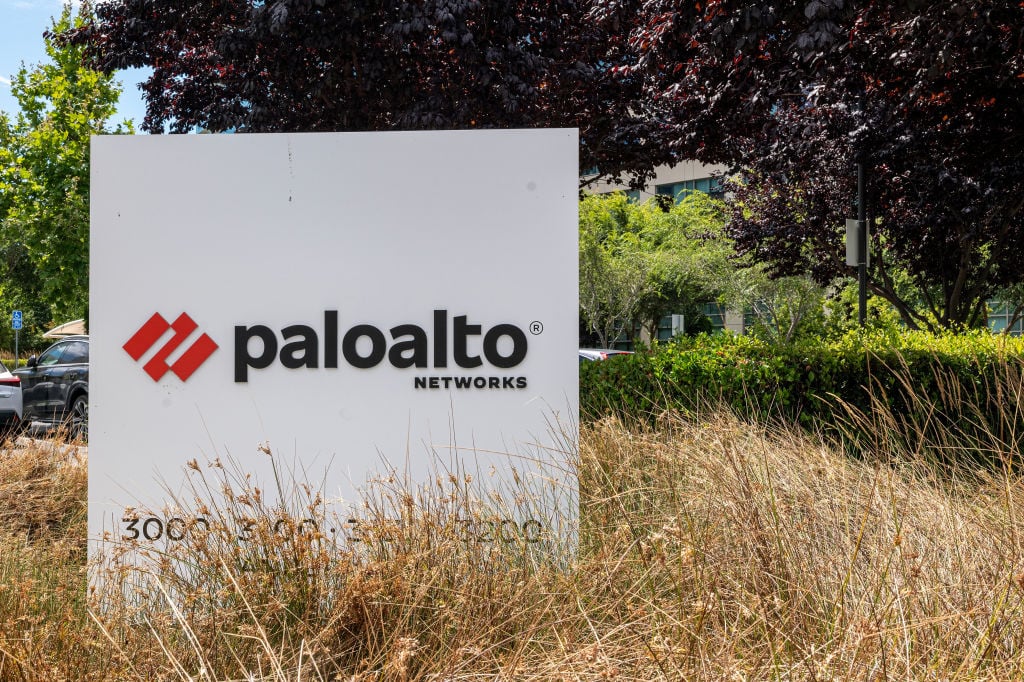 Palo Alto Networks logo amid grass in a field.