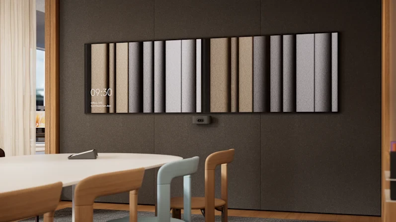 The standard Rally AI Camera blends into a smaller boardroom setup, offering intelligent framing and wide coverage in a more discreet, design-focused package