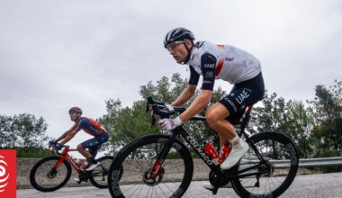 Fisher-Black defends time trial cycling title, Olympic triathlete Hayden Wilde fourth