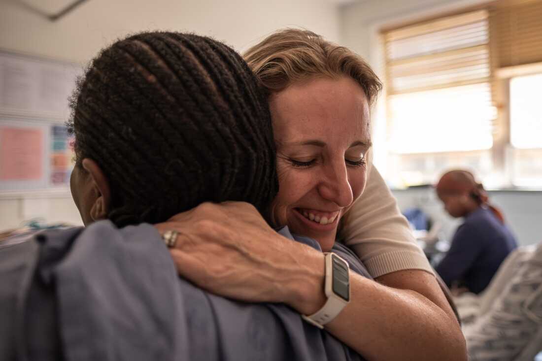 Cathy Cluver, professor of obstetrics and gynecology at thr University of Stellenbosch, embraces a pregant mother in Tygerberg Hospital in Cape Town, South Africa. Cluver leads a research team that is trialling a new drug for the treatment of pre-eclampsia, a potentially dangerous condition that affects expectant mothers.