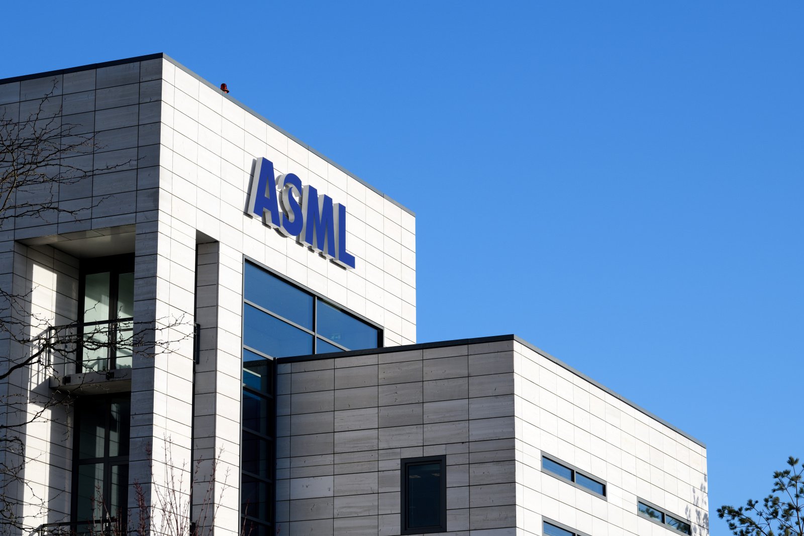 ASML logo on top of a company building.