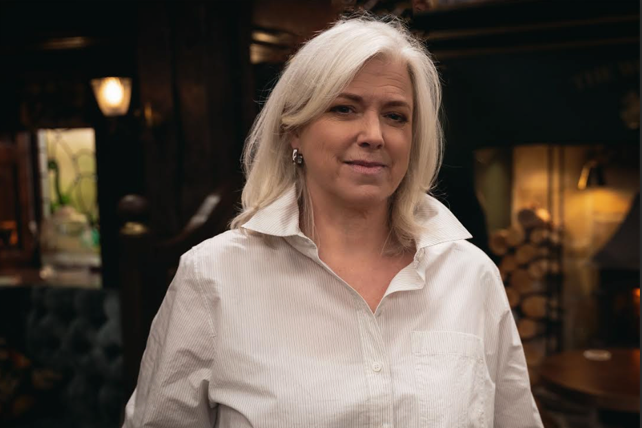 Caroline Harker as Doctor Todd in Emmerdale caroline harker as doctor todd in emmerdale posing in a pub in a white shirt.