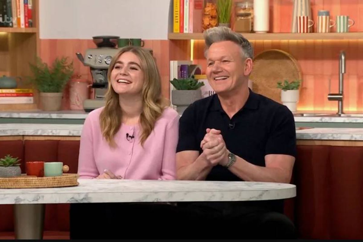 Gordon Ramsay and his daughter sit side by side