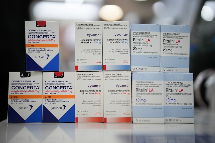 Attention Deficit Hyperactivity Disorder (ADHD) medications Concerta, Vyvanse and Ritalin on a pharmacy counter.