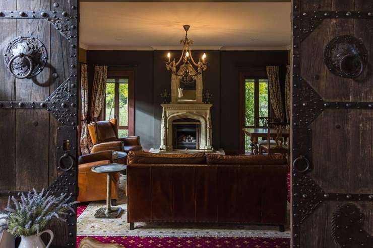 Corina Montgomery and David Lawrence are selling their French chateau, which looks centuries old but was completed in 2018. Photo / Supplied