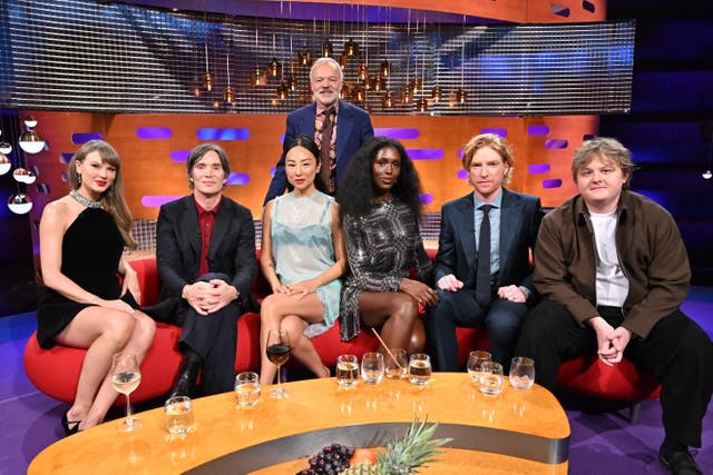 From left, Taylor Swift, Cillian Murphy, Greta Lee, Jodie Turner-Smith, Domhnall Gleeson and Lewis Capaldi with host Graham Norton during filming in October 2025 