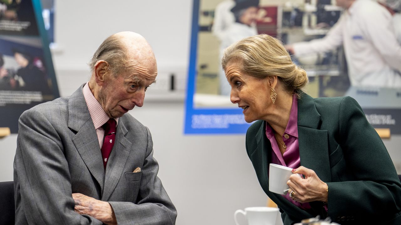 Duke of Kent and the Duchess of Edinburgh greet each other with a kiss as they take part in a rare joint engagement