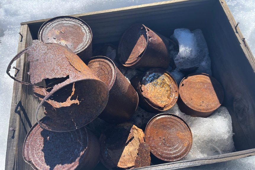 Images of an abandoned station in the icy and snowy Antarctic wilderness.