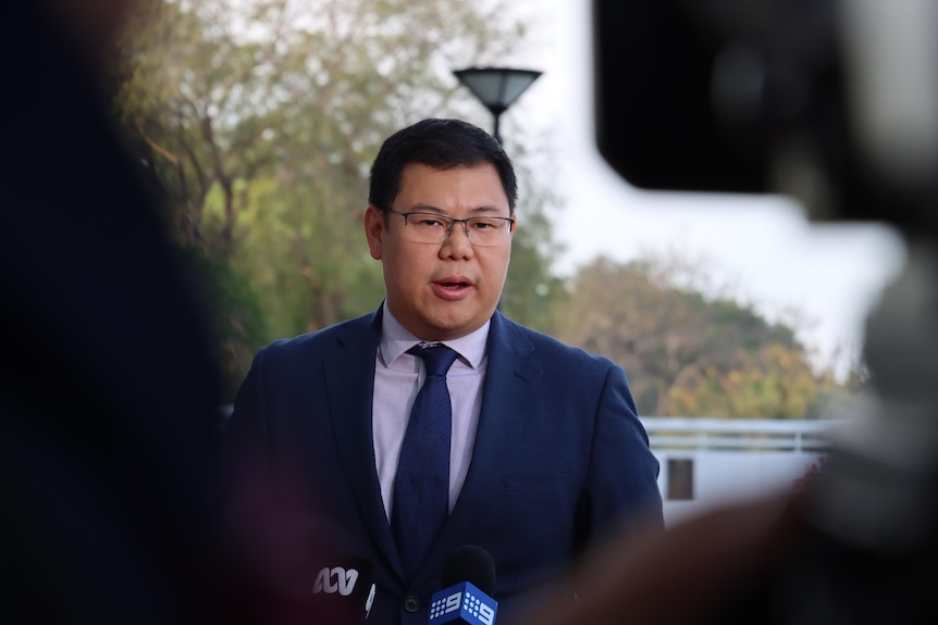 A man speaks during a media interview.