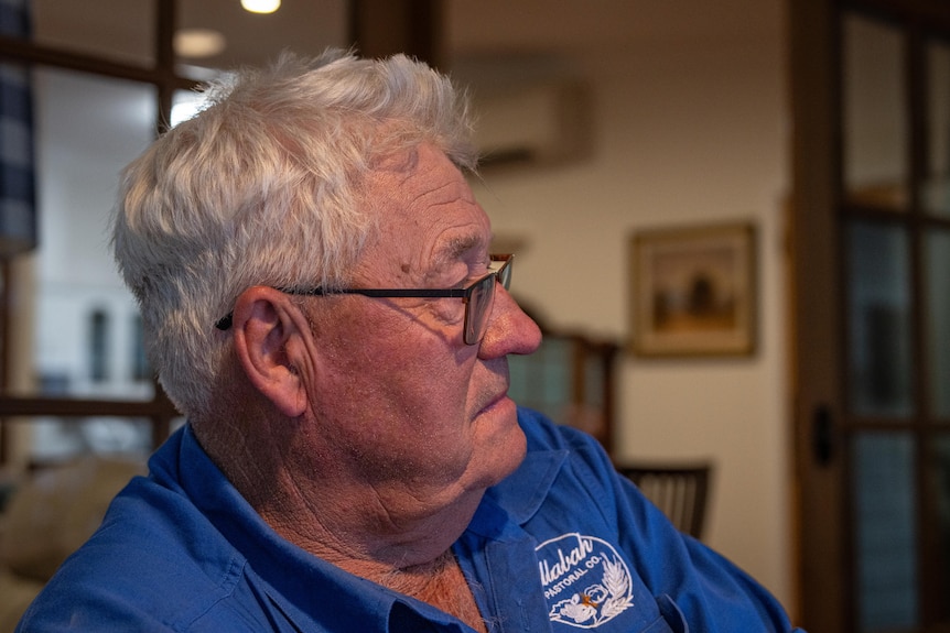 Murray Watson listening while his wife speaks