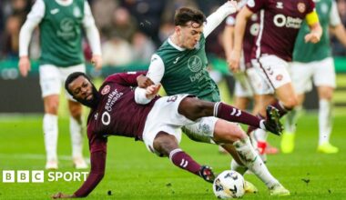 Hearts' Beni Beningime challenges Hibs' Josh Campbell