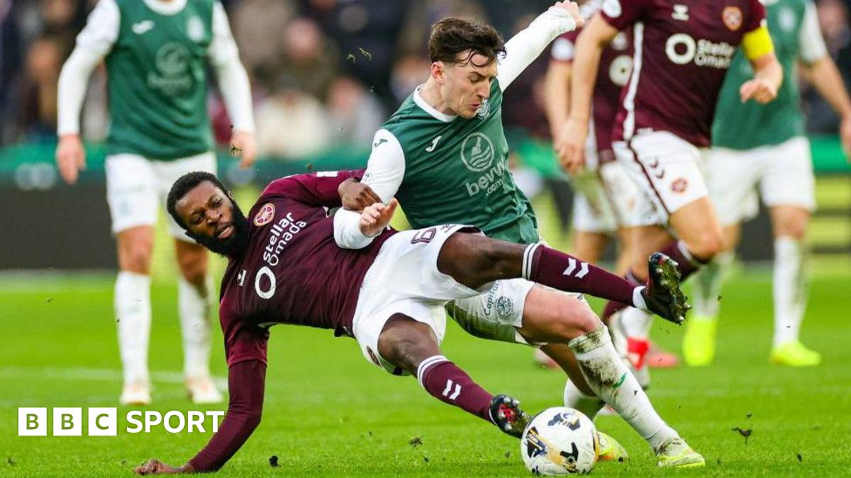 Hearts' Beni Beningime challenges Hibs' Josh Campbell