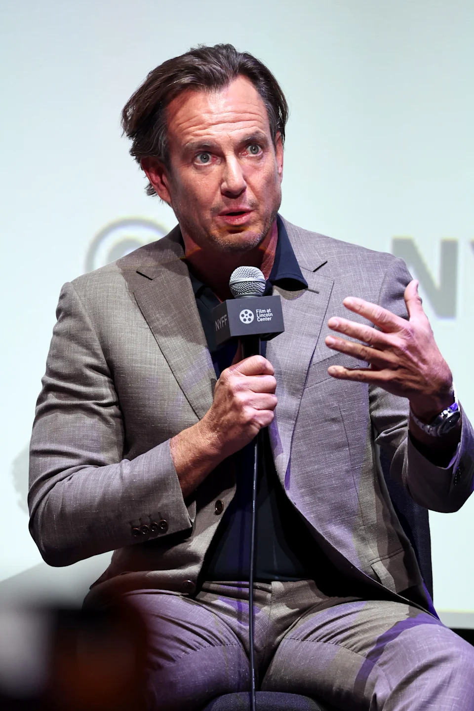 Will speaking into a microphone on stage at a film festival event