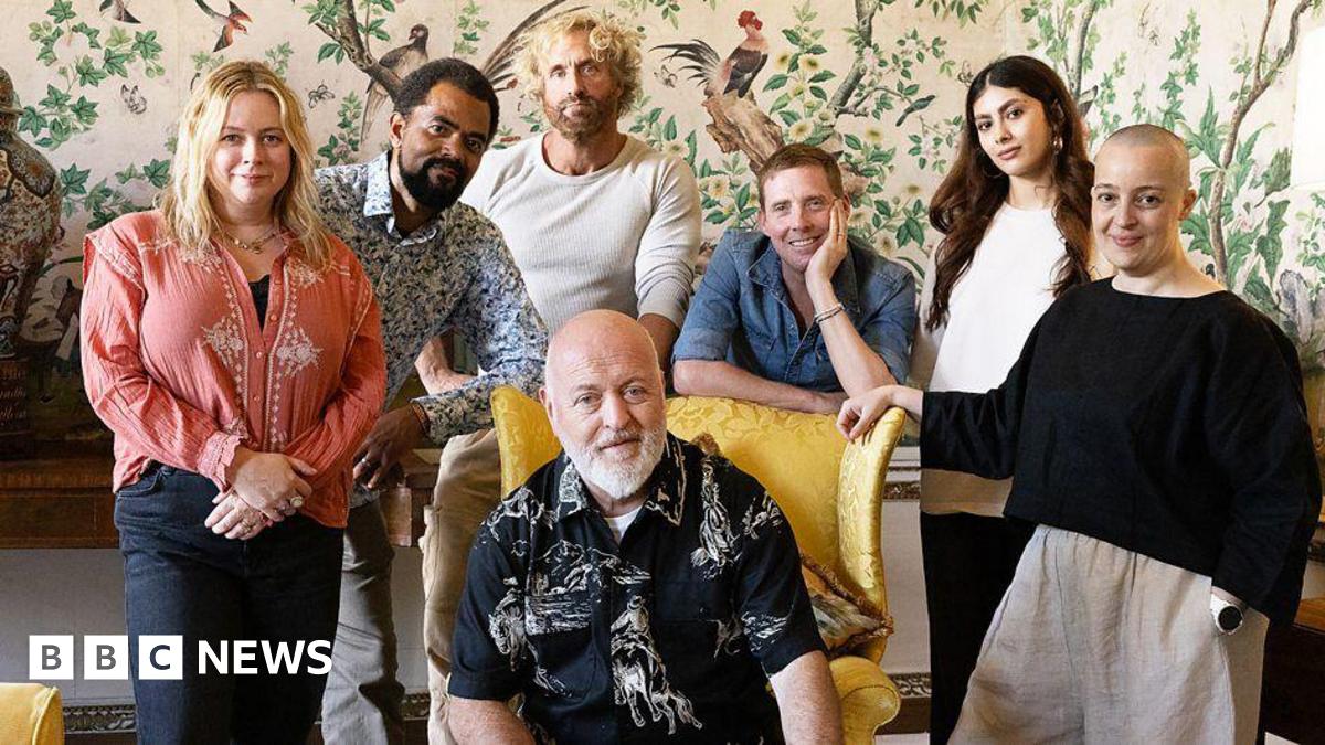 A group shot of the people featuring in a new BBC art show including Bill Bailey sat in a yellow chair and Ricky Wilson leaning on it smiling