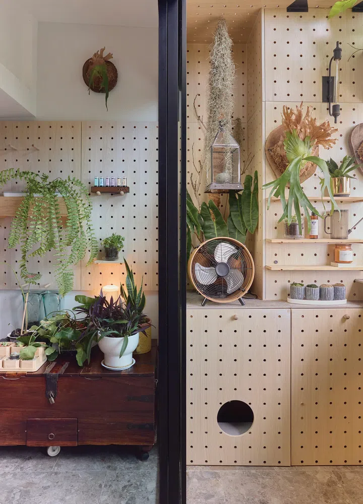 Pegboard cabinet doors in architect interior designer Winston Lim (of Winstudio)’s 3-room HDB in Pasir Ris.