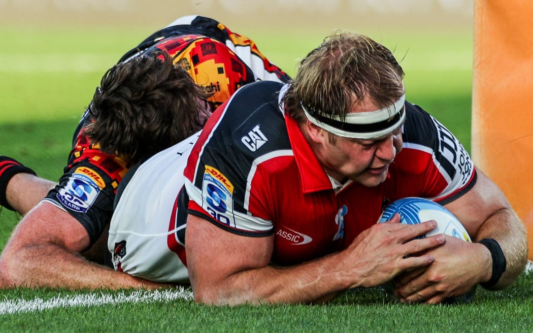 Crusaders' George Bell scores a try during the Chiefs vs Crusaders, Super Rugby Pacific match at FMG Stadium, Hamilton.