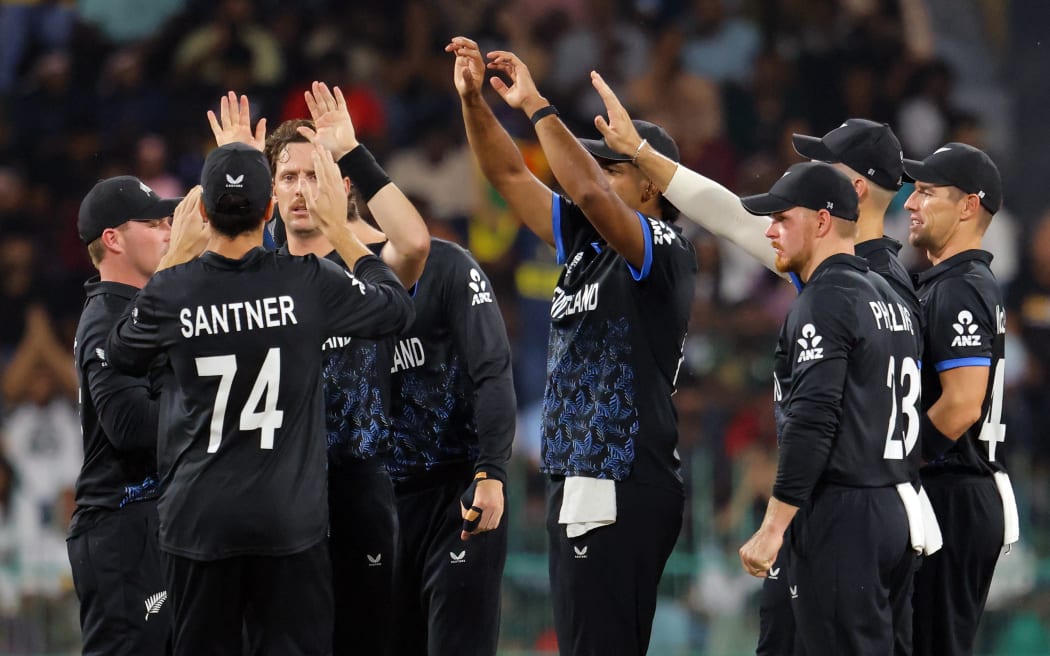 New Zealand player celebrate a wicket.