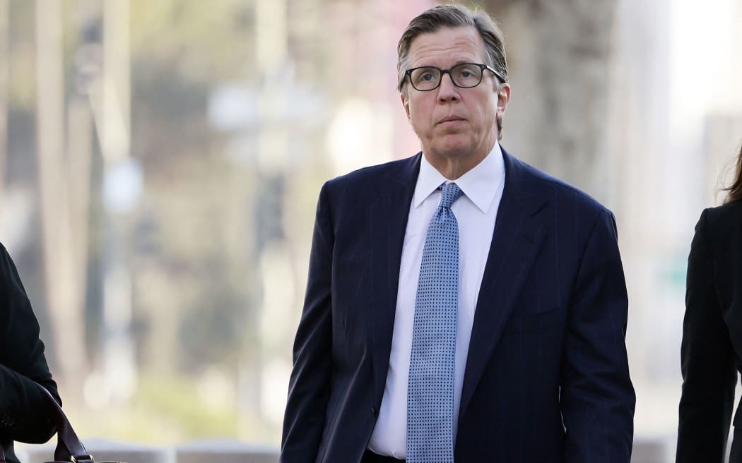LOS ANGELES, CALIFORNIA - FEBRUARY 26: Attorney Mark Lanier (C), who is representing the plaintiff “K.G.M.”, arrives at Los Angeles Superior Court at United States Court House on February 26, 2026 in Los Angeles, California. Plaintiff “K.G.M.” is scheduled to testify today in a landmark case accusing Meta and YouTube of building addictive social media platforms causing harm to children.   Mario Tama/Getty Images/AFP (Photo by MARIO TAMA / GETTY IMAGES NORTH AMERICA / Getty Images via AFP)
