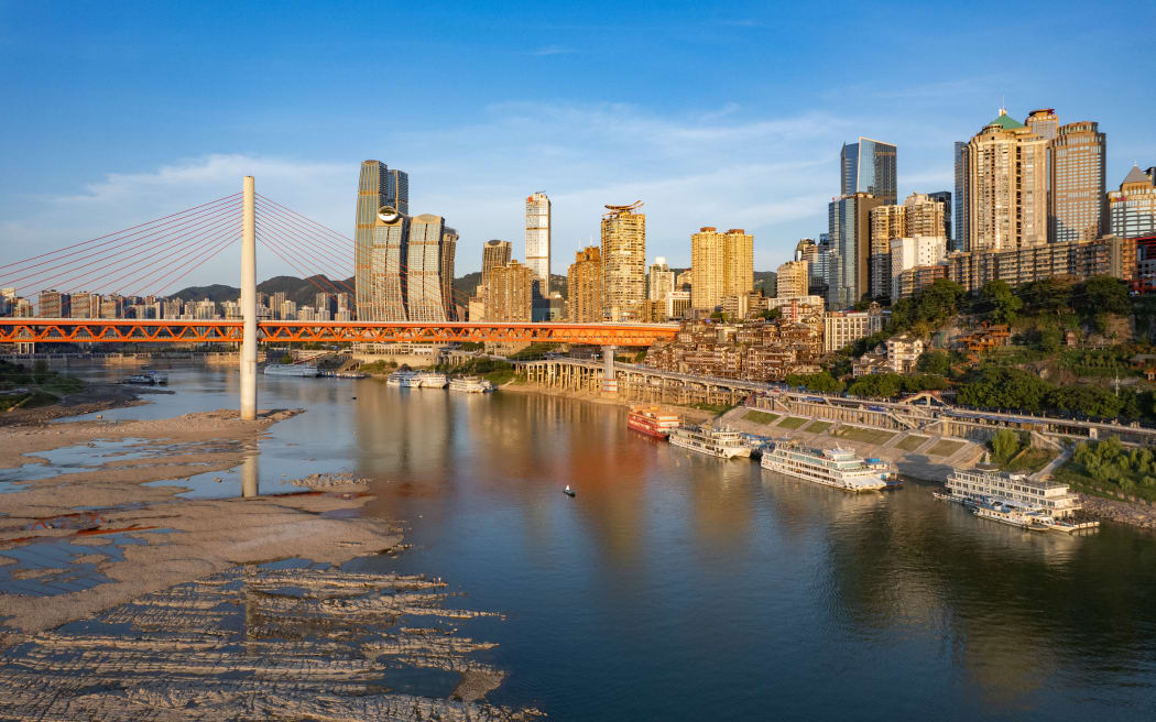 (FILE) The water level of the Yangtze River and Jialing River in the Chongqing section falls in Chongqing, China, August 17, 2022. (Photo by Costfoto/NurPhoto) (Photo by CFOTO / NurPhoto via AFP)