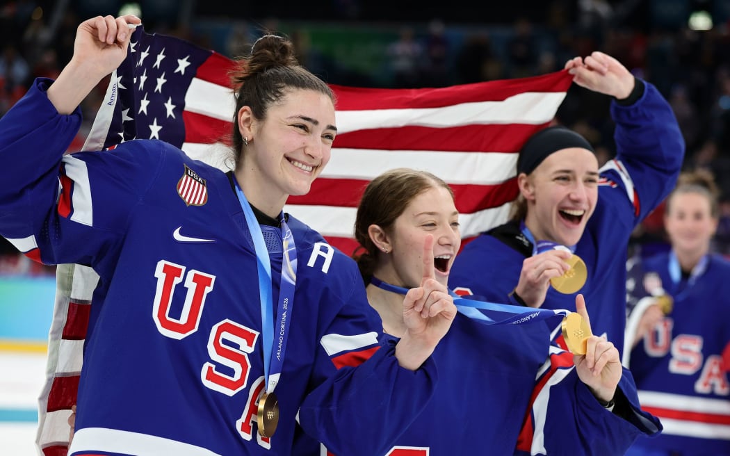 USA Womens Hockey Celebration
Caption: From left to right, Megan Keller, Aerin Frankel and Hayley Scamurra celebrate after the medal ceremony following the Women's Gold Medal match between the United States and Canada on February 19, in Milan, Italy.
Mandatory Credit: Andreas Rentz/Getty Images via CNN Newsource
