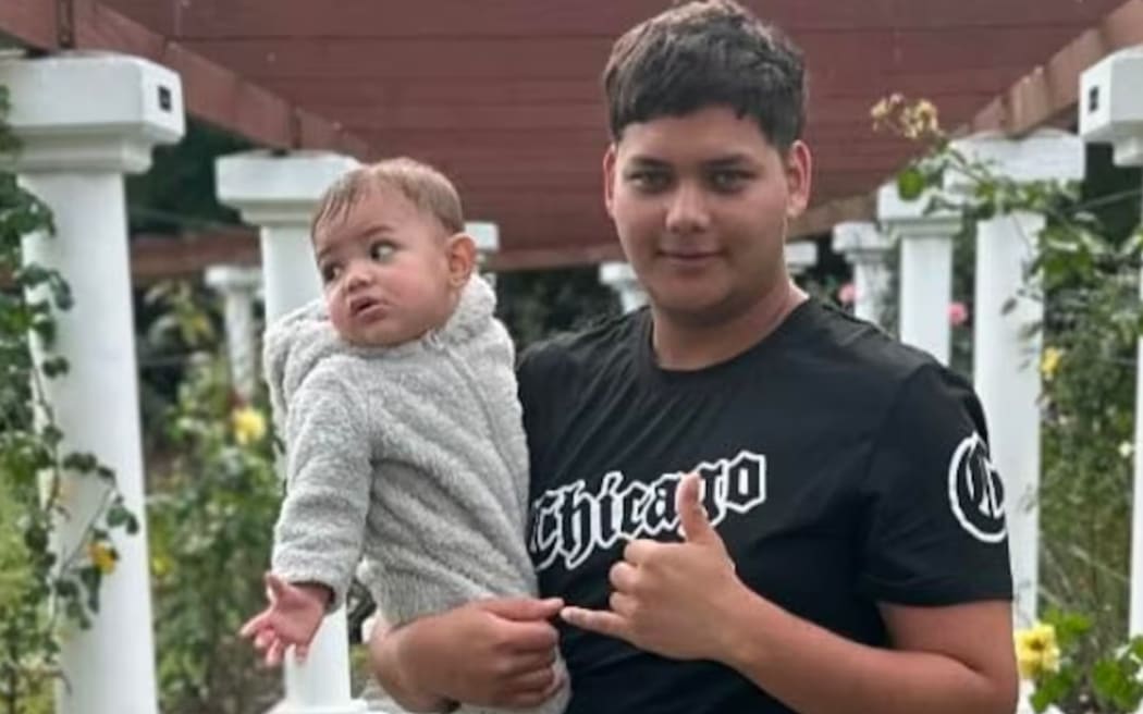 Mukzameel Mukhzar Ali pictured holding his baby Mustafa Mahir Ali, whom he admitted killing in their Te Kūiti home.
