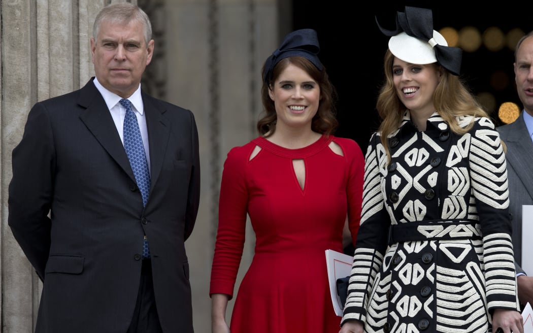 Britain's Prince Andrew (L), Britain's Princess Eugenie of York (2nd L), Britain's Princess Beatrice of York (R) leave after attending a national service of thanksgiving for the 90th birthday of Britain's Queen Elizabeth II at St Paul's Cathedral in London on June 10, 2016, which is also the Duke of Edinburgh's 95th birthday. Britain started a weekend of events to celebrate the Queen's 90th birthday. The Queen and the Duke of Edinburgh along with other members of the royal family will attend a national service of thanksgiving at St Paul's Cathedral on June 10, which is also the Duke of Edinburgh's 95th birthday. (Photo by JUSTIN TALLIS / AFP)