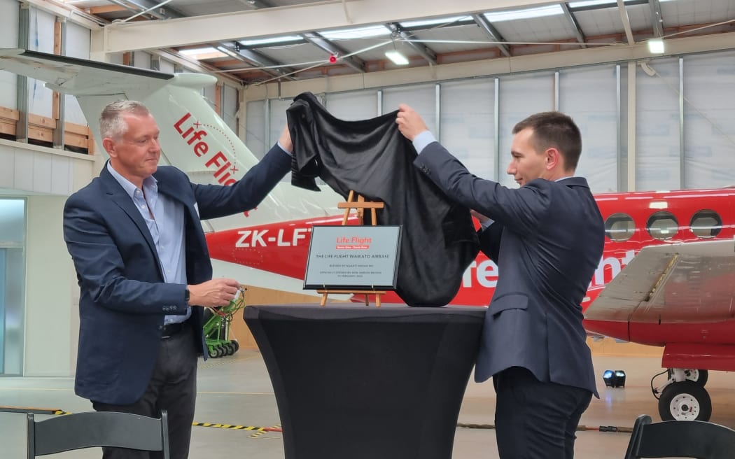Life Flight chief executive Mark Johnston and Health Minister Simeon Brown officially open the new aeromedical airbase for the upper north island at Hamilton airport.