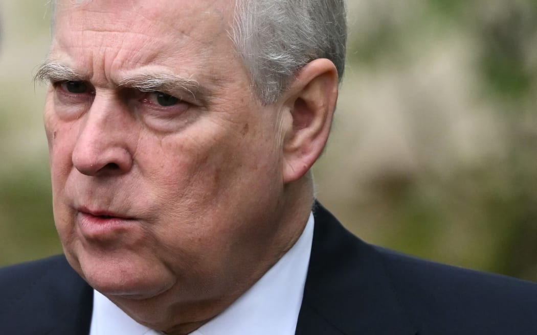 (FILES) Britain's Prince Andrew, Duke of York reacts as he leaves St. George's Chapel, in Windsor Castle, after attending the Easter Mattins Service, on March 31, 2024. UK police announced on Thursday 19, 2026, the arrest of ex-prince Andrew on suspicion of misconduct. (Photo by JUSTIN TALLIS / AFP)