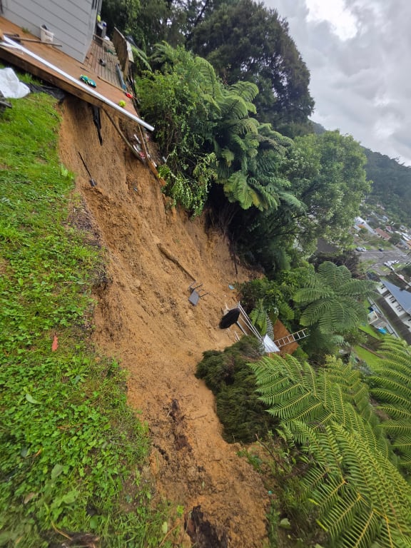 Stokes Valley painter Aaron Pahl says he shouted to his children to get to safety when a large slip fell away from the base of his home - leaving the house uninhabitable -on Monday morning.