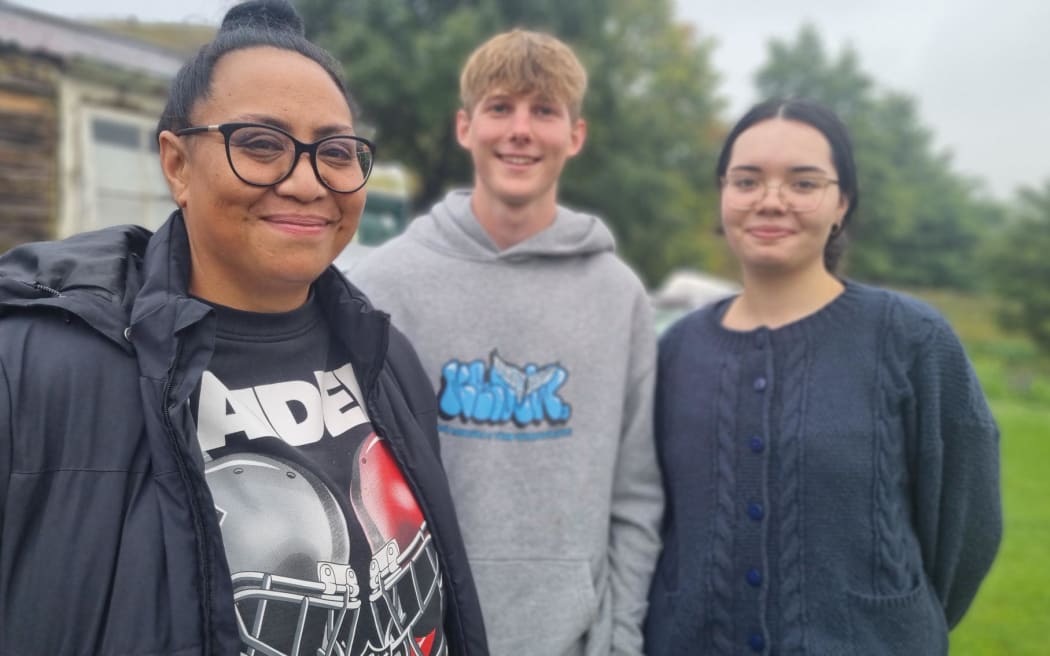 Lulu Simi, left, reckons helping out stranded travellers such as Aucklanders Max Briggs and Leilani Kwan-Him is central to its role.