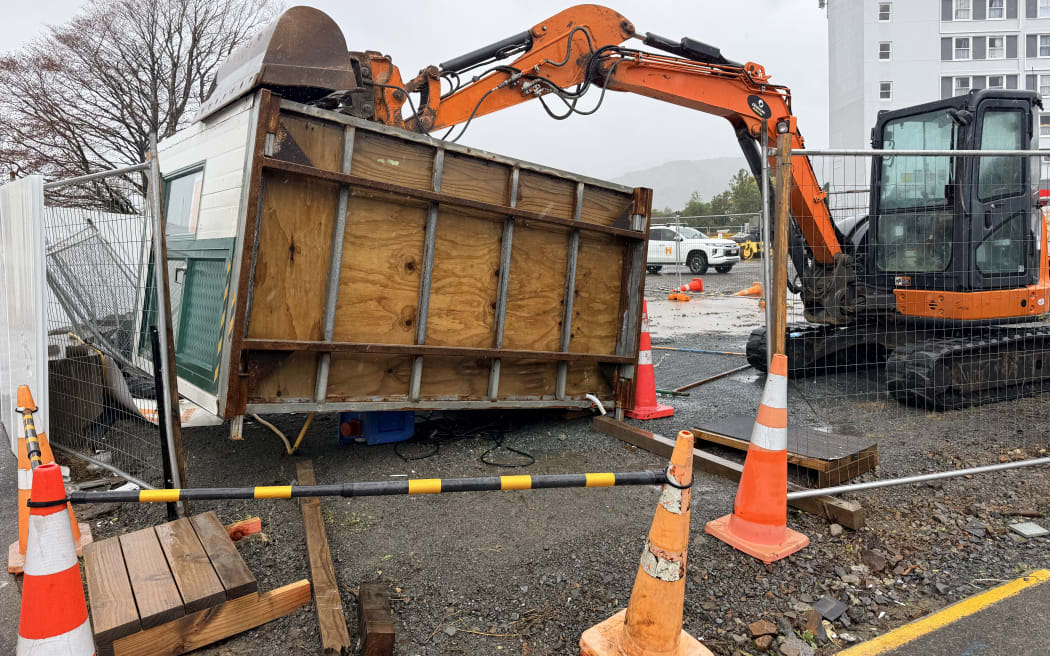 Work being done after a portacom blew over at the Sir Mark Dunajtschik Mental Health Centre in Lower Hutt overnight on Monday.