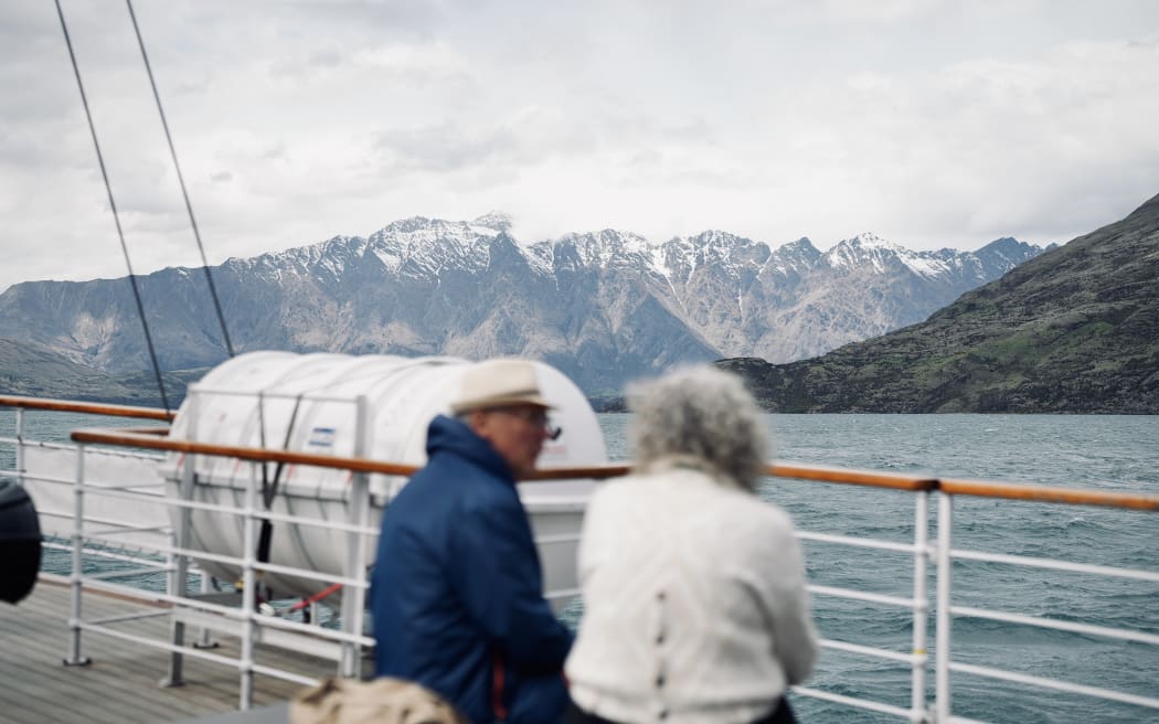 Tourists on a boat in Queenstown. Photo taken in November 2025.
