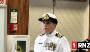 Senior navy officer found not guilty of encouraging junior to kiss her