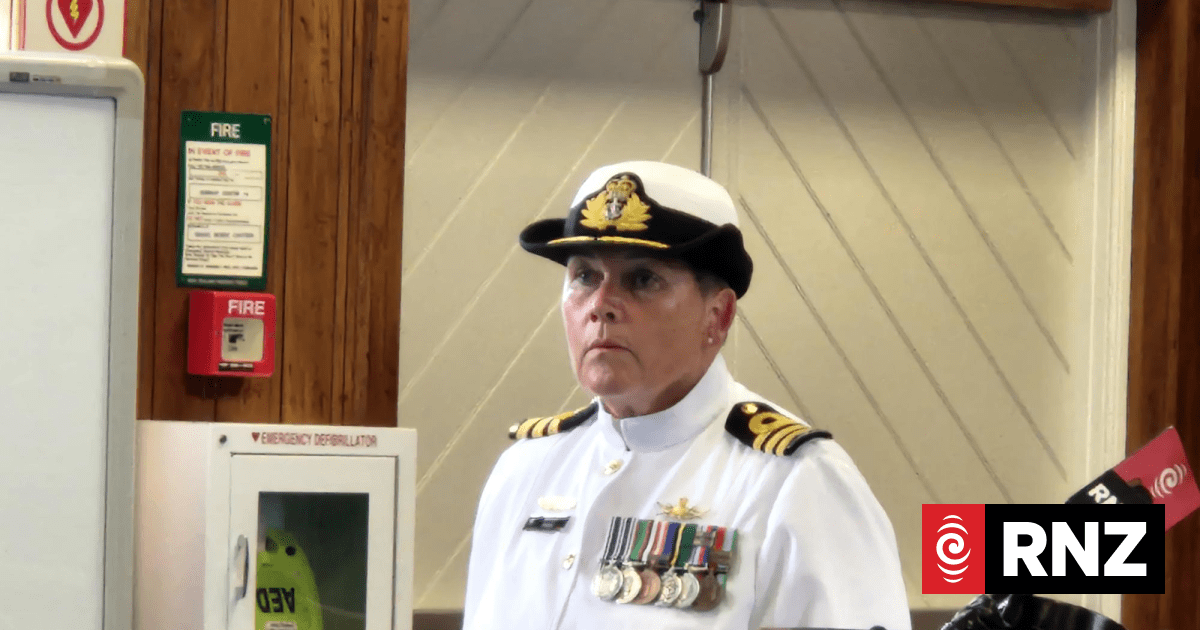 Senior navy officer found not guilty of encouraging junior to kiss her