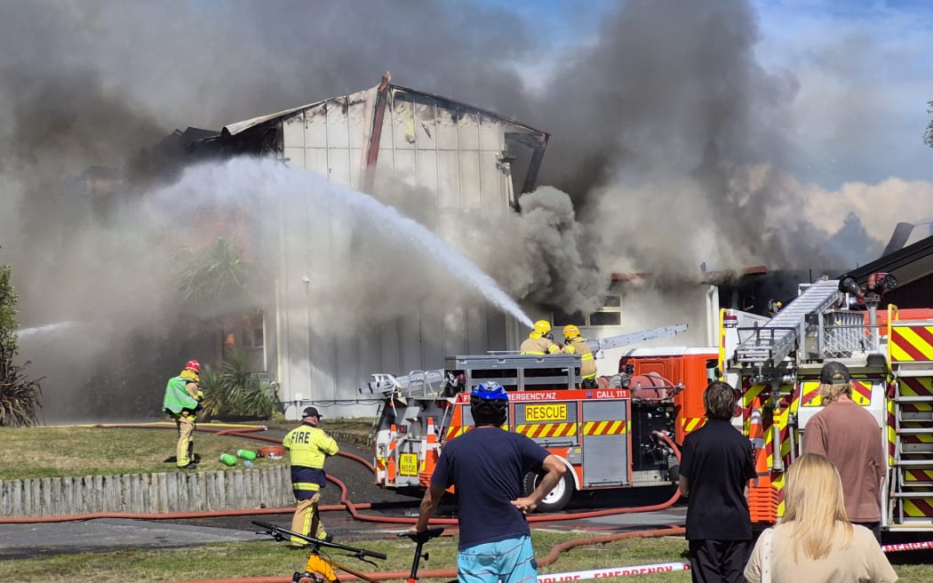 Firefighters battling the blaze at Taupō -nui-a-Tia College.