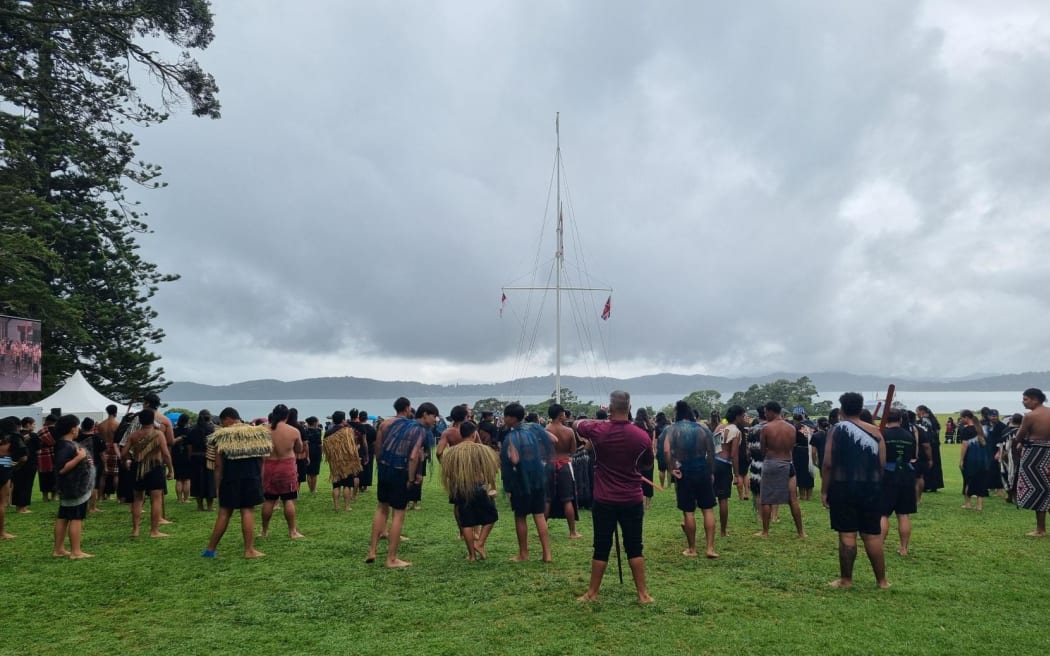 People gather at the Waitangi Treaty Grounds.