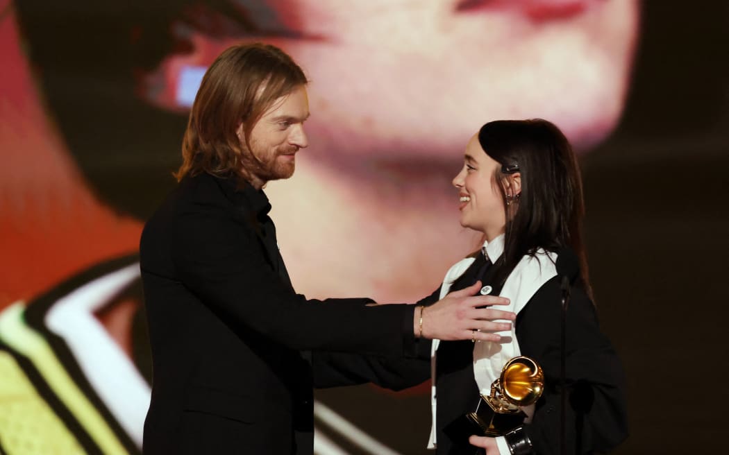 Finneas O'Connell and Billie Eilish accept the Song Of The Year award for “WILDFLOWER” onstage during the 68th GRAMMY Awards at Crypto.com Arena on February 01, 2026 in Los Angeles, California.