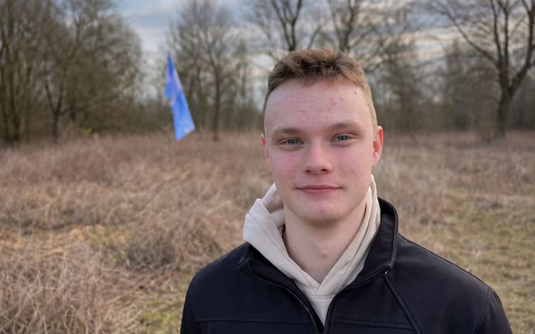 Daniel Jackson pictured in front of the Verdisian flag.