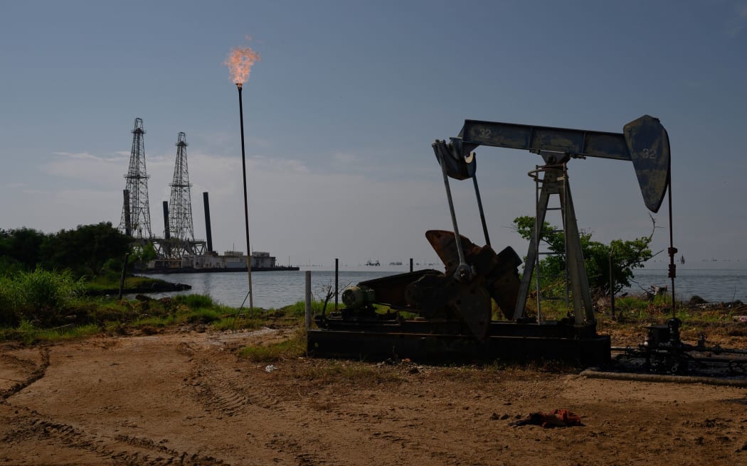 A Petroleos de Venezuela SA (PDVSA) oil pumpjack on Lake Maracaibo in Cabimas, Zulia state, Venezuela, in November 2023.